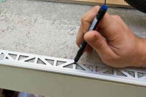 Aluminum tile edging hole marking